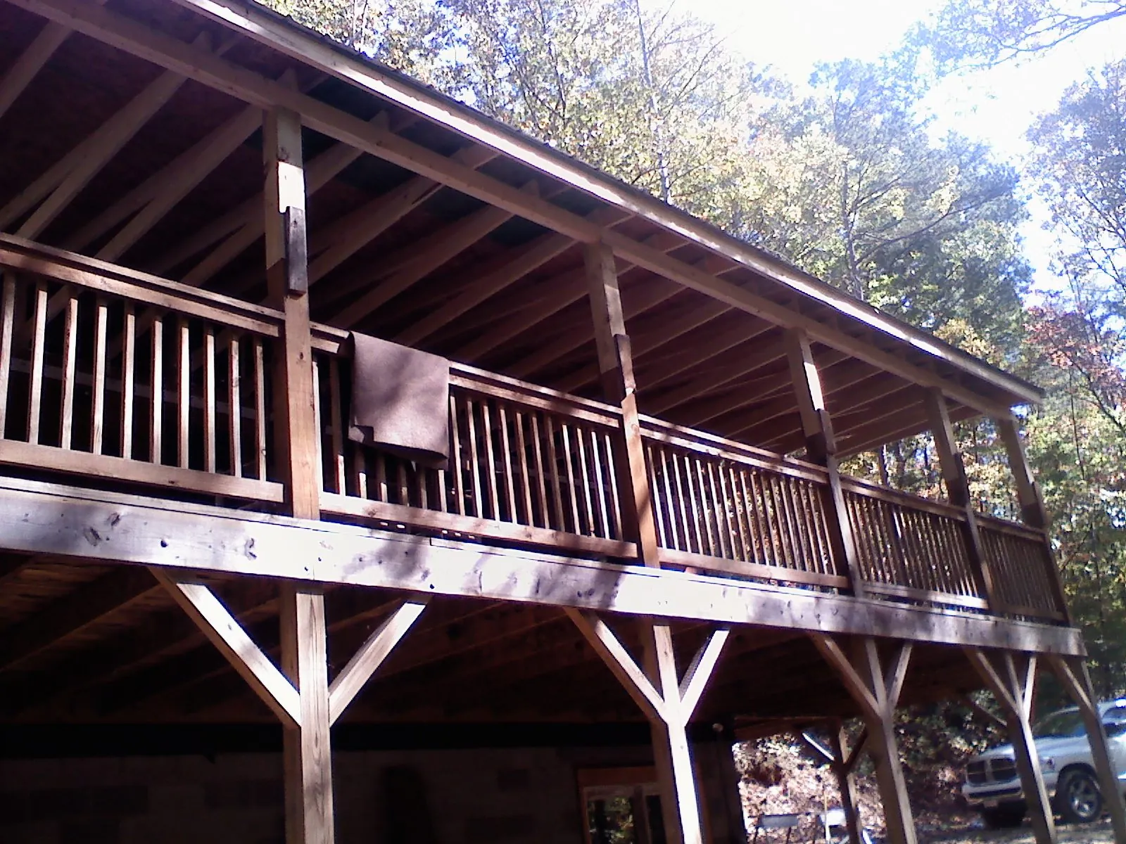Timber framing under a new elevated porch and deck — Roof Leak Repair in Owego by Roofing Brothers